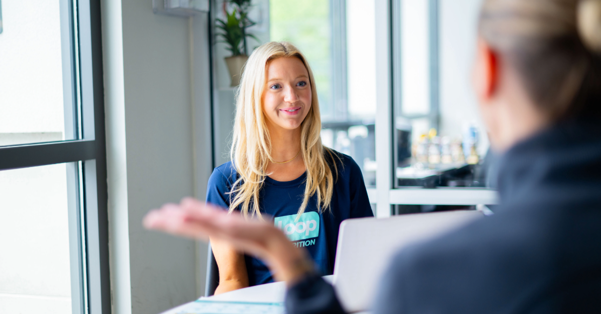 a female dietitian talking with a client 