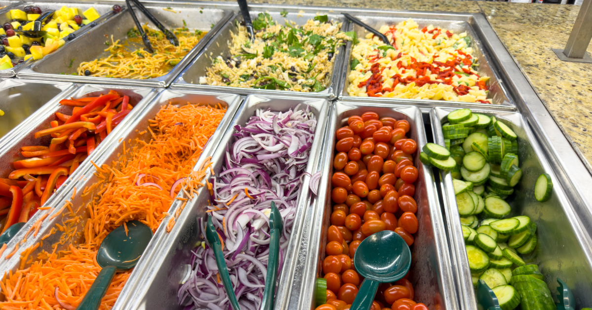 a bar full of salad toppings to make a nutrient dense meal 