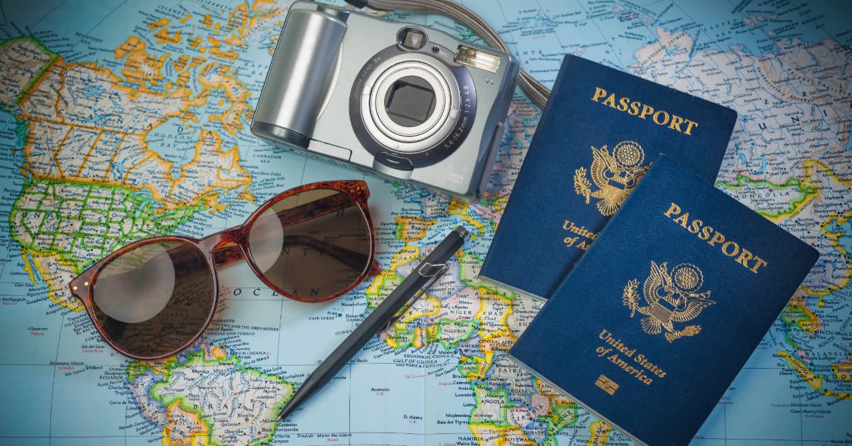map, passports, sunglasses for travel to europe
