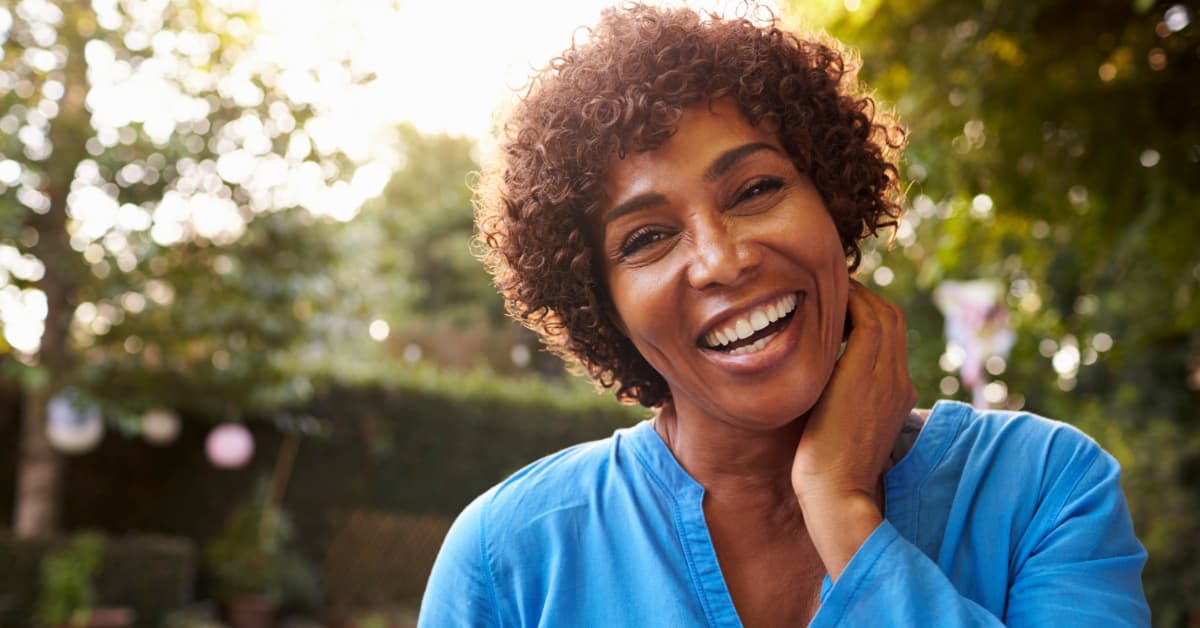 Middle aged woman smiling and happy 