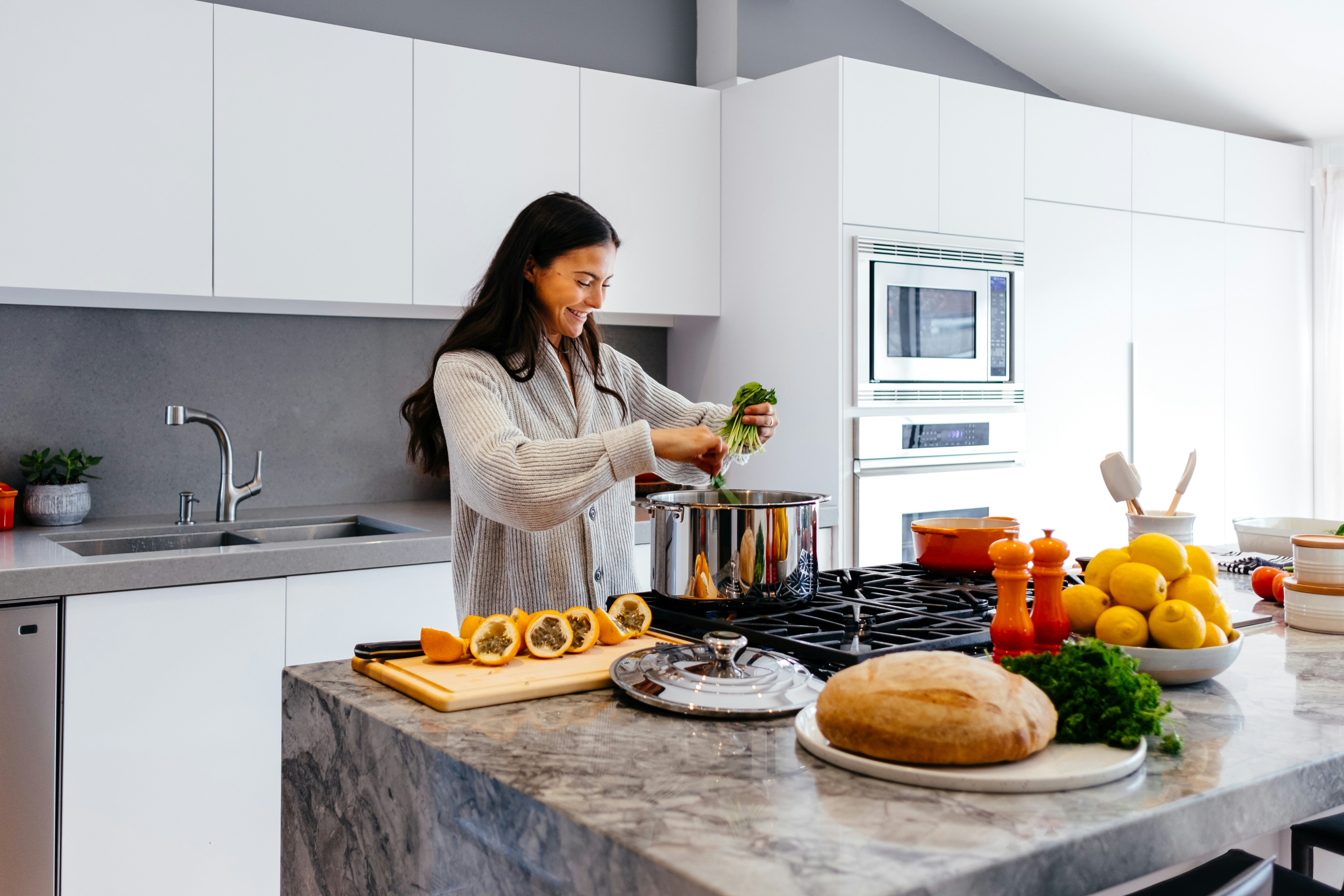 woman cooking a macronutrient balanced meal